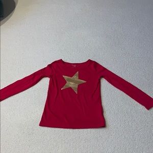 Red long sleeve with star in middle